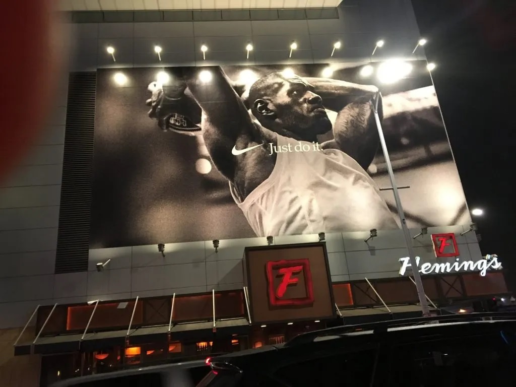 LED flood lights mounted on billboard structure in daylight